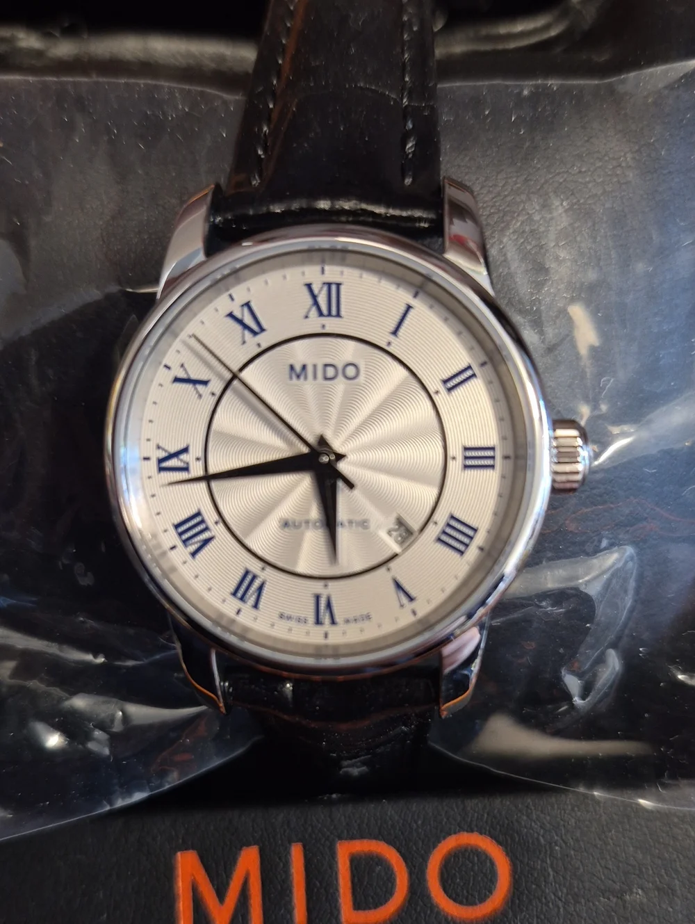 Mido Silver Dial Watch with Blue Roman Numerals and Black Strap